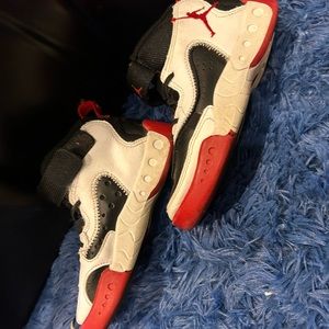 Red black and white jump man shoes boys 12